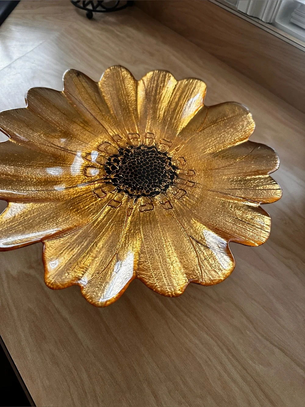 Gold sunflower glass decorative plate on a pedestal stand
